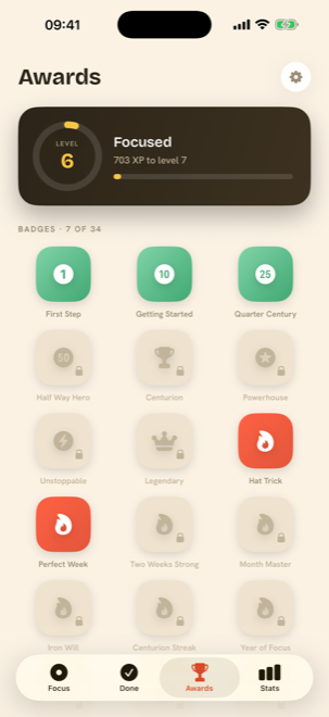 Awards screen: a dark level ring card reading Level 6 Focused, above a three-column grid of 34 badge tiles with unlocked green and coral tiles and locked grey tiles