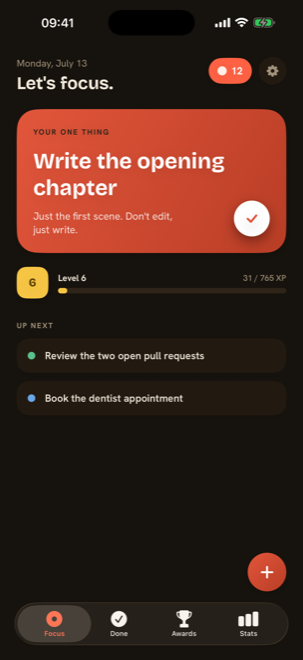Focus screen in dark mode on a warm espresso background